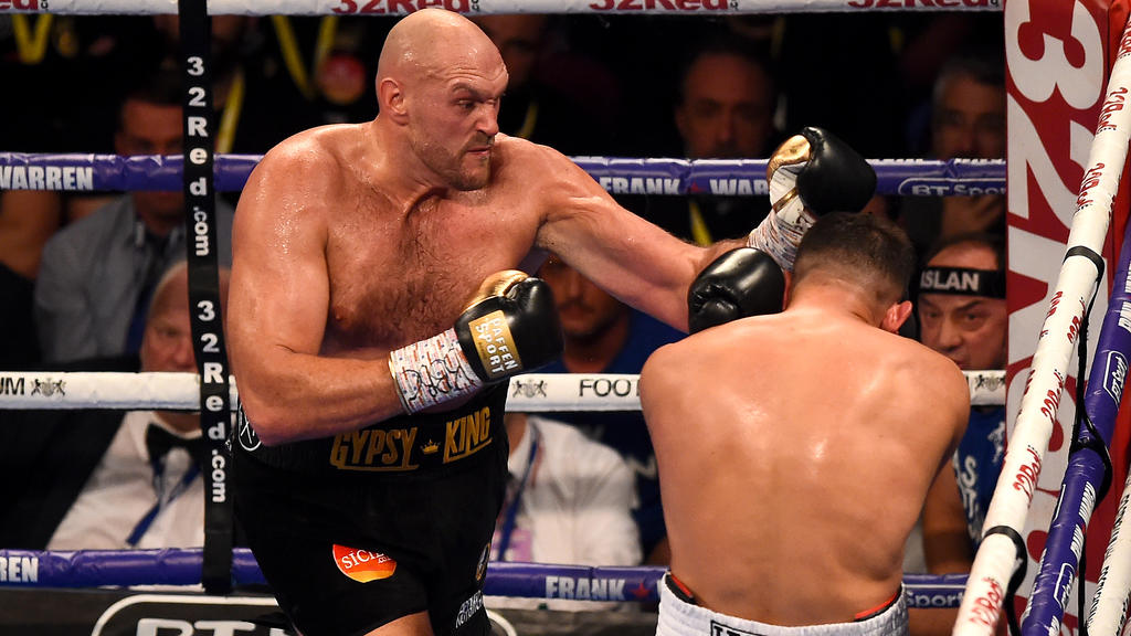 MANCHESTER, ENGLAND - JUNE 09: Tyson Fury punches Sefer Seferi during there heavyweight contest at Manchester Arena on June 9, 2018 in Manchester, England. (Photo by Nathan Stirk/Getty Images)