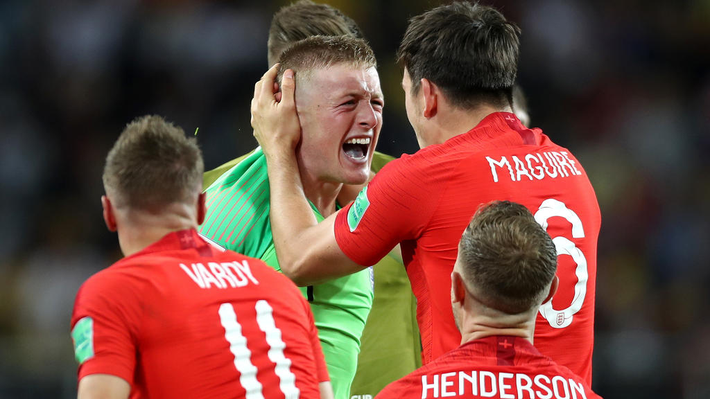 MOSCOW, RUSSIA - JULY 03: Jordan Pickford of England and Harry Maguire of England celebrate following their sides victory in the 2018 FIFA World Cup Russia Round of 16 match between Colombia and England at Spartak Stadium on July 3, 2018 in Moscow,
