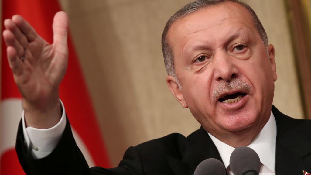 FILE PHOTO: Turkish President Tayyip Erdogan makes a speech during a ceremony marking the second anniversary of the attempted coup at the Presidential Palace in Ankara, Turkey, July 15, 2018. REUTERS/Umit Bektas/File Photo