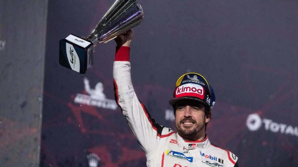 Fernando Alonso of 8 Toyota Gazoo Racing Toyota TS050 Hybrid poses celebrates on the podium during the 2018 FIA WEC 6 Hours of Shanghai in Shanghai, China, 18 November 2018. Toyota recorded a fourth victory of the 2018/19 World Endurance Championship