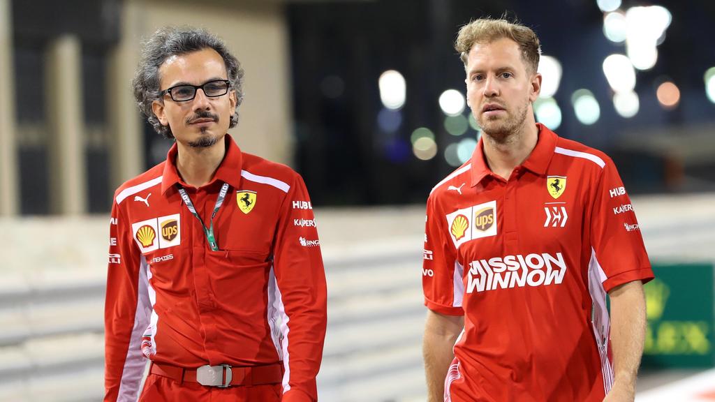 2018 Abu Dhabi GP YAS MARINA CIRCUIT, UNITED ARAB EMIRATES - NOVEMBER 22: Sebastian Vettel, Ferrari walks the track with Laurent Mekies, Ferrari and Riccardo Adami (ITA) Ferrari Race Engineer during the Abu Dhabi GP at Yas Marina Circuit on November