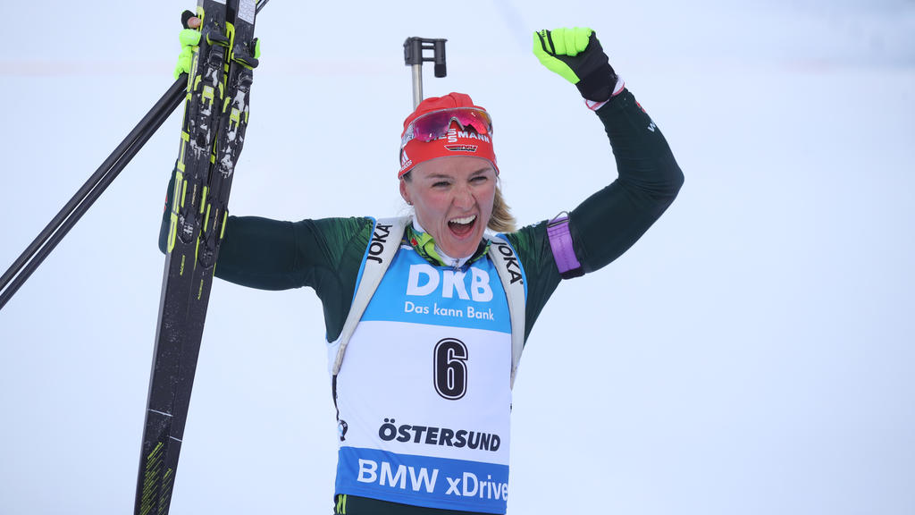 OSTERSUND, SWEDEN - MARCH 10: Denise Herrmann of Germany celebrates winning the gold medal during the Women's 10km Pursuit race at the IBU Biathlon World Championships at Swedish National Biathlon Arena on March 10, 2019 in Ostersund, Sweden. (Photo