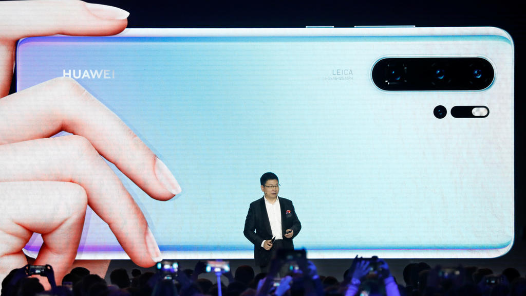 Richard Yu, CEO of the Huawei Consumer Business Group unveils the new Huawei P30 and P30 Pro smartphones during a launch event in Paris, France, March 26, 2019. REUTERS/Charles Platiau