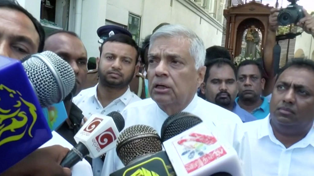 Sri Lanka's Prime Minister Ranil Wickremesinghe speaks to media at St. Anthony's Shrine in Colombo, Sri Lanka, April 21, 2019 in this still image obtained from a video. Derana TV/via Reuters TV THIS IMAGE HAS BEEN SUPPLIED BY A THIRD PARTY. MANDATO