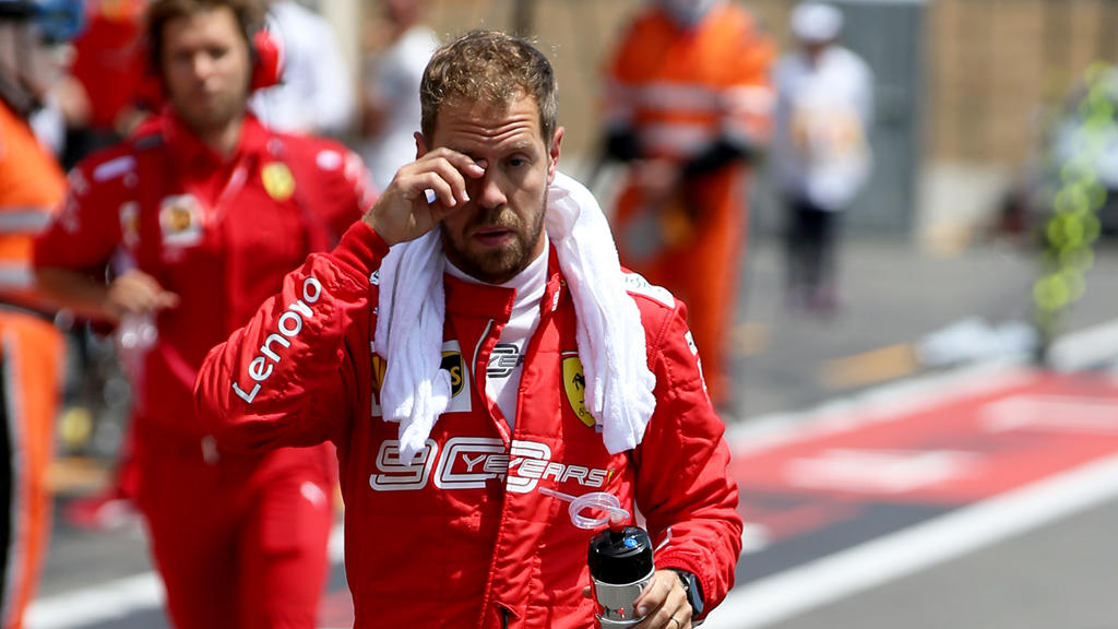 LE CASTELLET, FRANCE - JUNE 23: Sebastian Vettel of Germany and Ferrari walks to the grid before the F1 Grand Prix of France at Circuit Paul Ricard on June 23, 2019 in Le Castellet, France. (Photo by Charles Coates/Getty Images)