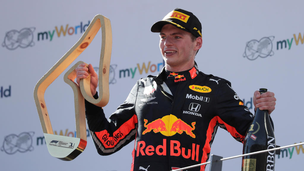 Formula One F1 - Austrian Grand Prix - Red Bull Ring, Spielberg, Austria - June 30, 2019 Red Bull's Max Verstappen celebrates after winning the race on the podium REUTERS/Leonhard Foeger