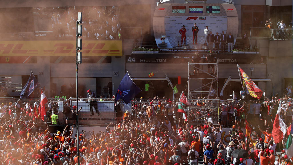 Formula One F1 - Austrian Grand Prix - Red Bull Ring, Spielberg, Austria - June 30, 2019 General view as Red Bull's Max Verstappen celebrates winning the race with second placed Ferrari's Charles Leclerc and third placed Mercedes' Valtteri Bottas o