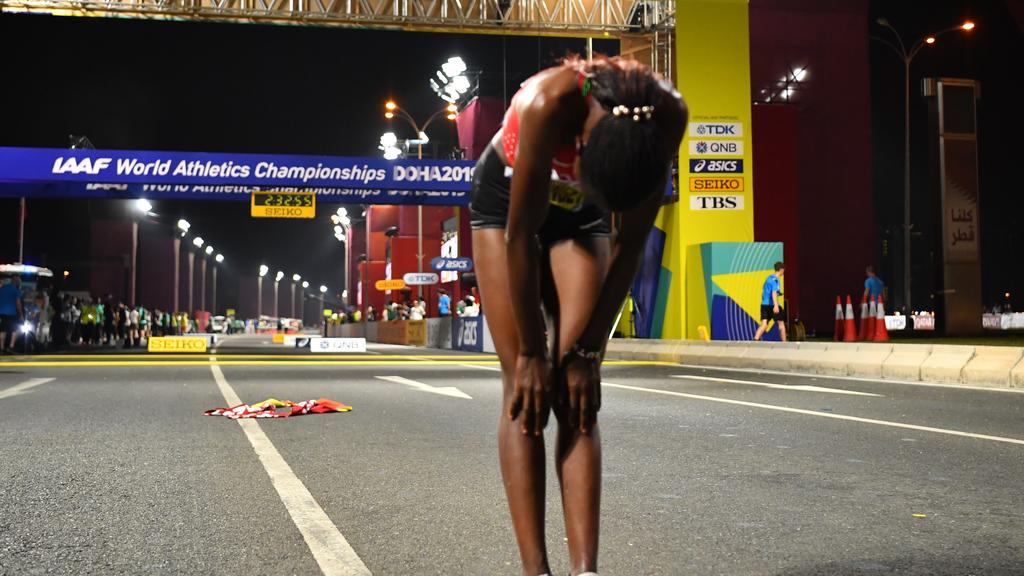 Athletics - World Athletics Championships - Doha 2019 - Women's Marathon - Doha, Qatar - September 28, 2019 Kenya's Ruth Chepngetich celebrates winning the race REUTERS/Dylan Martinez