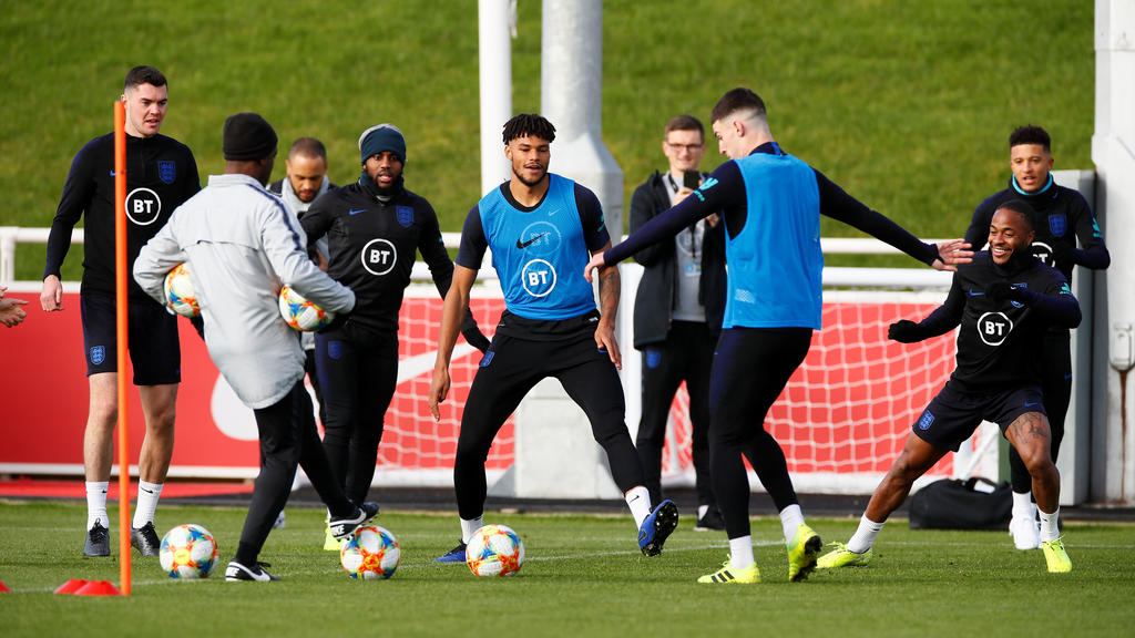 Soccer Football - Euro 2020 Qualifier - England Training - St. George’s Park, Burton upon Trent, Britain - October 10, 2019 England's Michael Keane, Raheem Sterling and Tyrone Mings with team mates during training Action Images via Reuters/Jaso