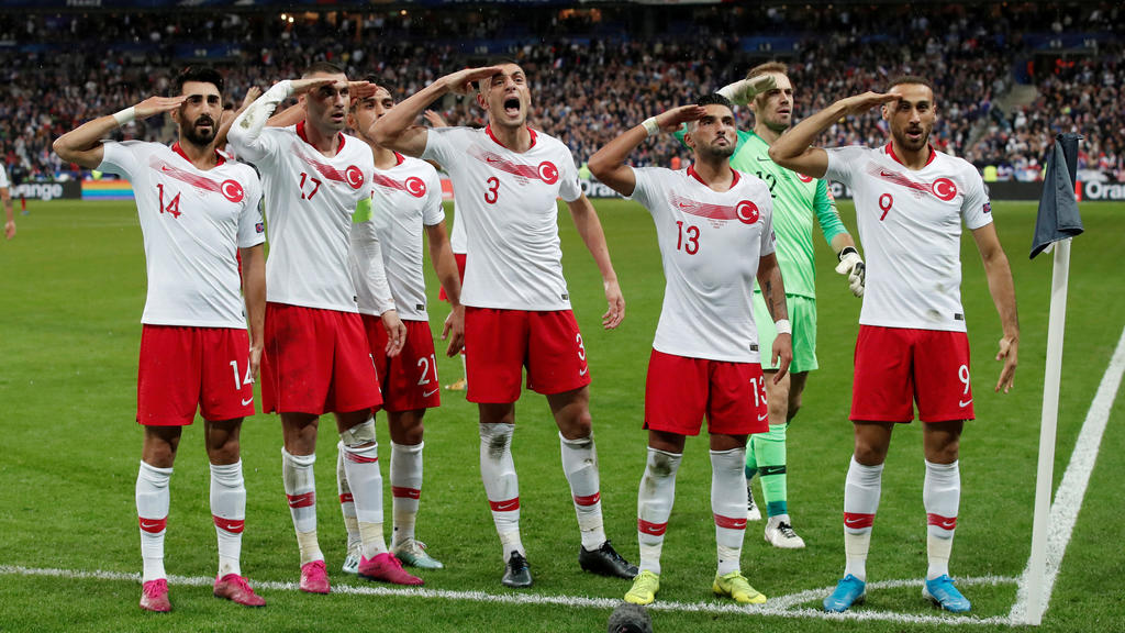 Soccer Football - Euro 2020 Qualifier - Group H - France v Turkey - Stade De France, Saint-Denis, France - October 14, 2019 Turkey players salute after Kaan Ayhan celebrates scoring their first goal REUTERS/Benoit Tessier TPX IMAGES OF THE DAY