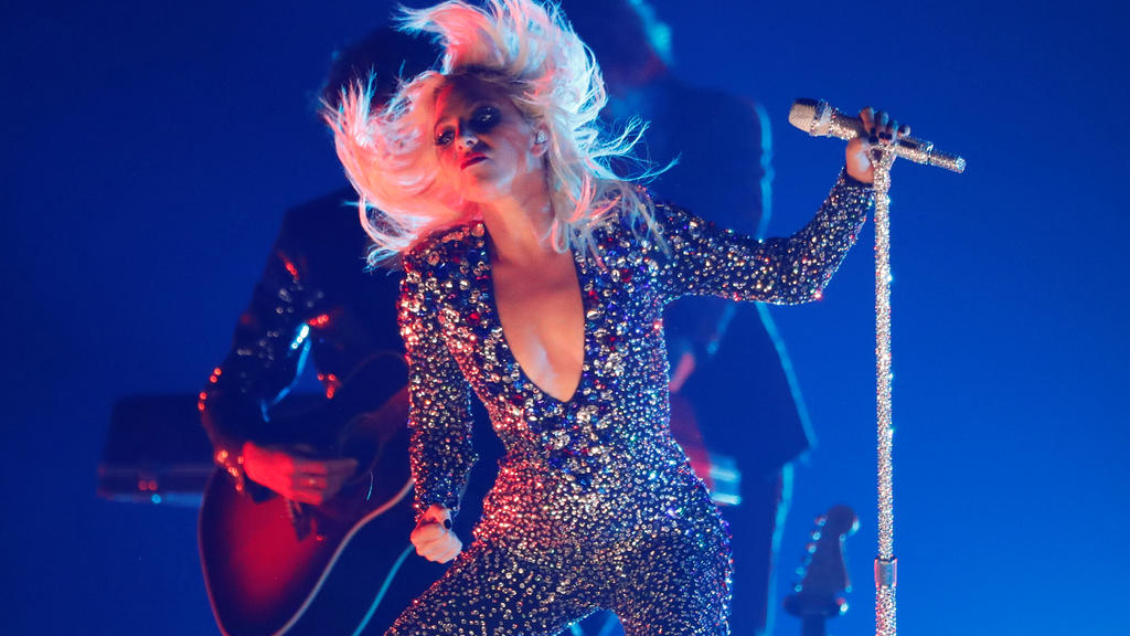 FILE PHOTO: 61st Grammy Awards - Show - Los Angeles, California, U.S., February 10, 2019 - Lady Gaga performs. REUTERS/Mike Blake - HP1EF2B09CM6W/File Photo