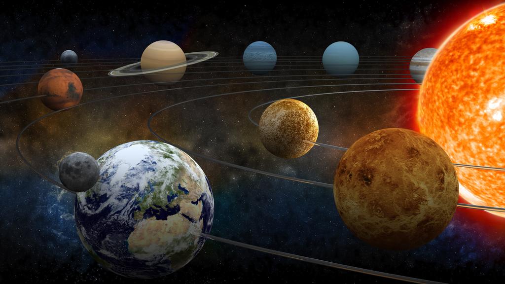 The sun and nine planets of our system orbiting.