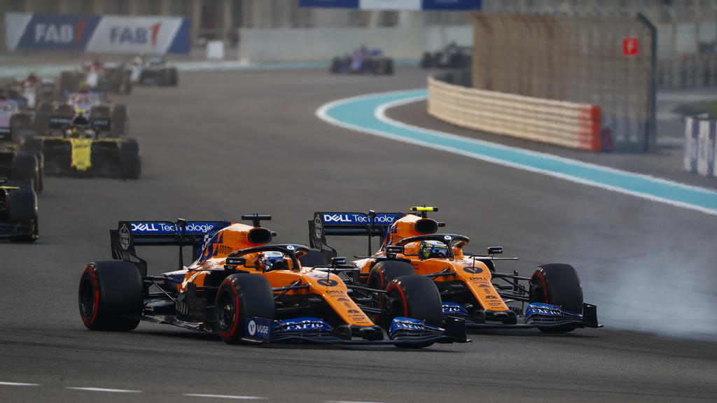 2019 Abu Dhabi GP YAS MARINA CIRCUIT, UNITED ARAB EMIRATES - DECEMBER 01: Carlos Sainz Jr., McLaren MCL34, battles with Lando Norris, McLaren MCL34 during the Abu Dhabi GP at Yas Marina Circuit on December 01, 2019 in Yas Marina Circuit, United Arab