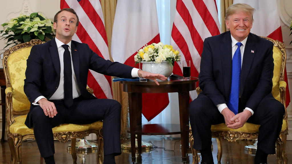 France's President Emmanuel Macron gestures during the meeting with U.S. President Donald Trump, ahead of the NATO summit in Watford, in London, Britain, December 3, 2019. Ludovic Marin/Pool via REUTERS