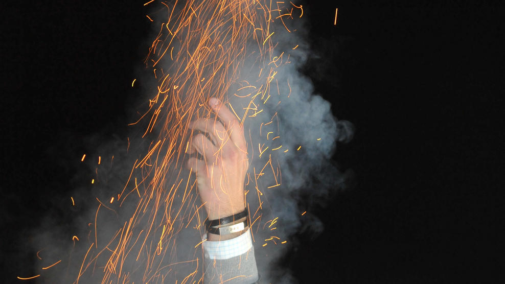 Silvesterrakete mit Hand