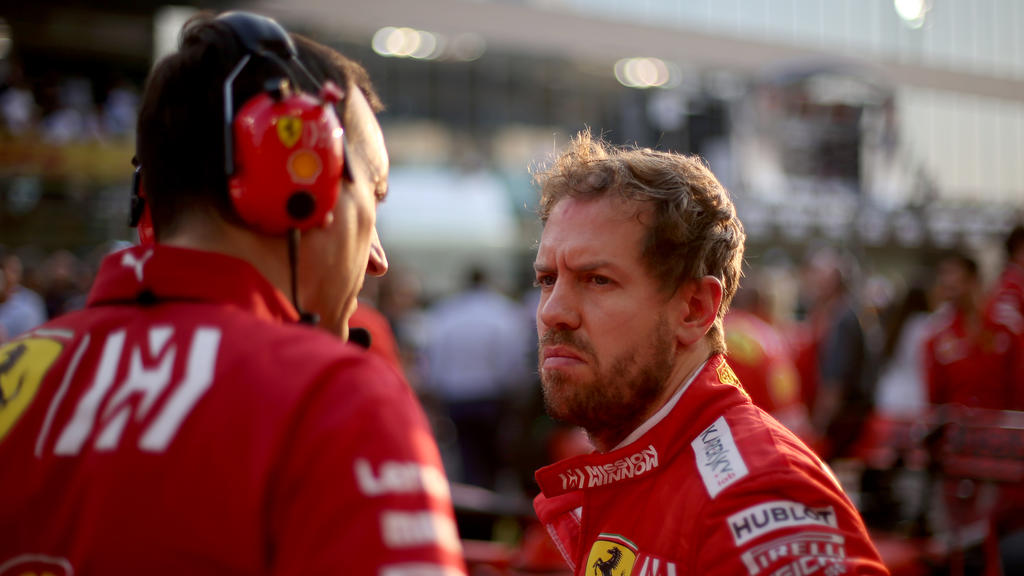 ABU DHABI, UNITED ARAB EMIRATES - DECEMBER 01: Sebastian Vettel of Germany and Ferrari prepares to drive on the grid before the F1 Grand Prix of Abu Dhabi at Yas Marina Circuit on December 01, 2019 in Abu Dhabi, United Arab Emirates. (Photo by Charle