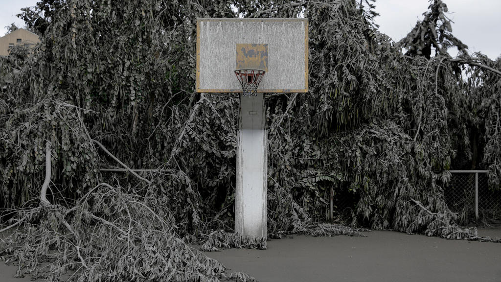 A basketball court is blanketed with volcanic ash in a resort near the erupting Taal Volcano in Talisay, Batangas, Philippines, January 14, 2020. REUTERS/Eloisa Lopez
