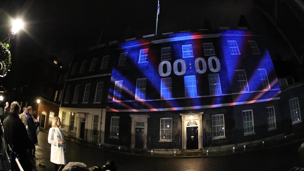 BBC Political editor Laura Kuenssberg watches as the clock counted down to 00:00 as it was projected onto Number 10 Downing Street in Whitehall on the day the UK finally leaves the European Union today at 11.00pm, after a 2016 referendum saw the maj