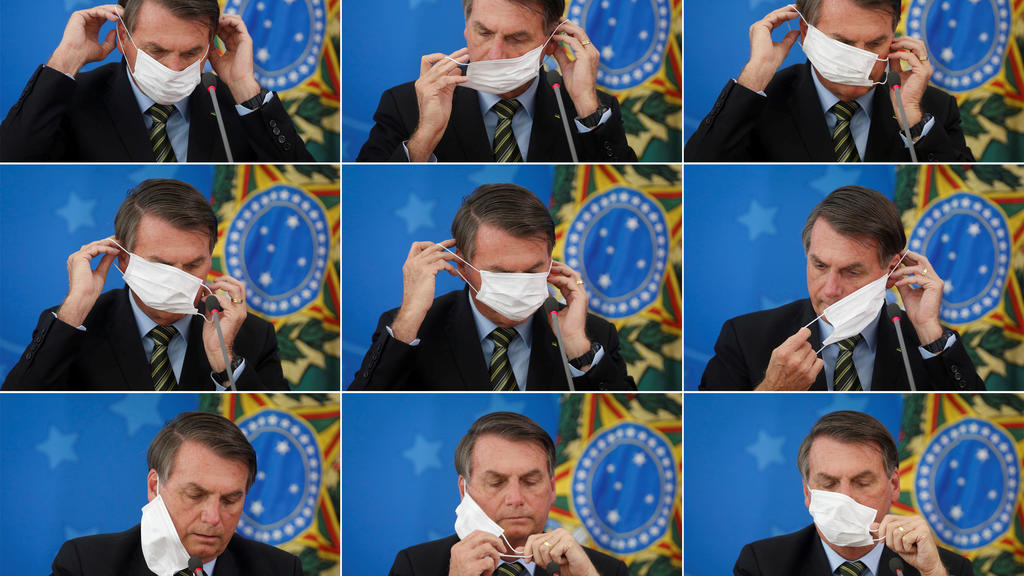 A combination of picture shows Brazil's President Jair Bolsonaro adjusting his protective face mask during a press statement to announce federal judiciary measures to curb the spread of the coronavirus disease (COVID-19) in Brasilia, Brazil March 18,