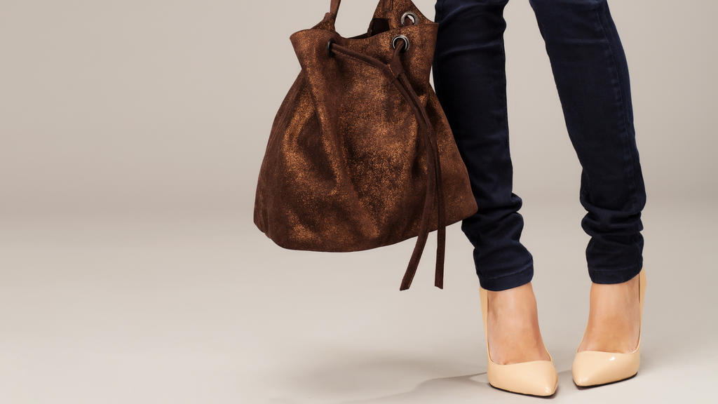 Elegant woman with a fashion bag