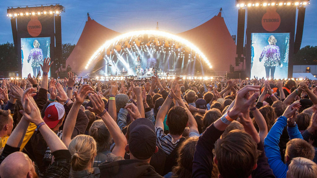 FILE - 03/07/2014, Denmark, Roskilde: British band The Rolling Stones opens Orange Stage at Roskilde Festival 2014. This year, the music festival in Roskilde is due to be canceled due to the crown crisis: next summer it should be bigger