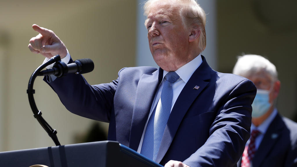 President Donald Trump answers questions during a press briefing about the coronavirus in the Rose Garden of the White House, Friday, May 15, 2020, in Washington. (AP Photo/Alex Brandon)