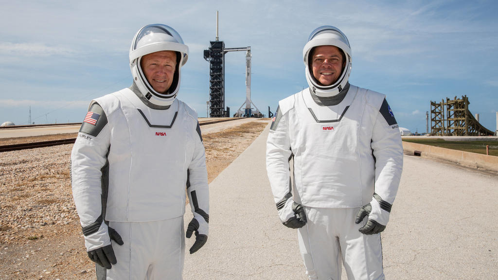 NASA astronauts Douglas Hurley left and Robert Behnken right participate in a dress rehearsal for launch at the agency s Kennedy Space Center in Florida on May 23, 2020, ahead of NASA s SpaceX Demo-2 mission to the International Space Station. Demo-