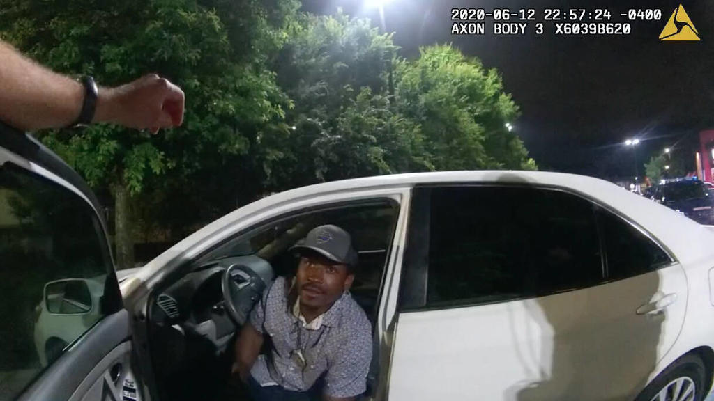 June 12, 2020, Atlanta, Georgia, USA: This screen grab taken from body camera video provided by the show the officers approaching RAYSHARD BROOKS in his car, which was parked in a Wendy s drive-in lane, and asking him to move it. Brooks was later sh