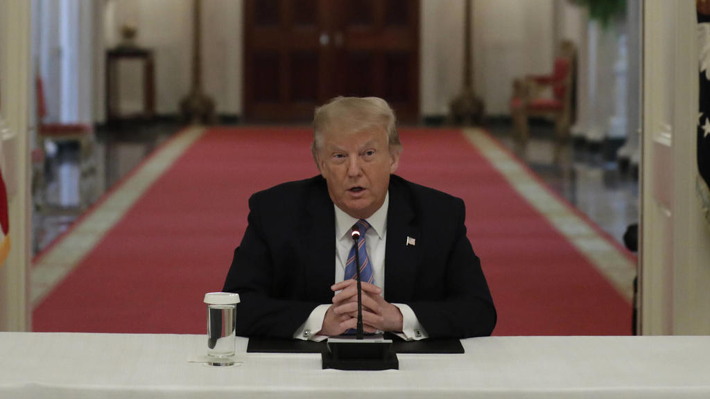 U.S. President Donald Trump speaks between Vice President Mike Pence and First Lady Melania Trump as they participate in a National Dialogue on Safely Reopening Schools at the White House in Washington on Tuesday, July 7, 2020. PUBLICATIONxINxGERxSU