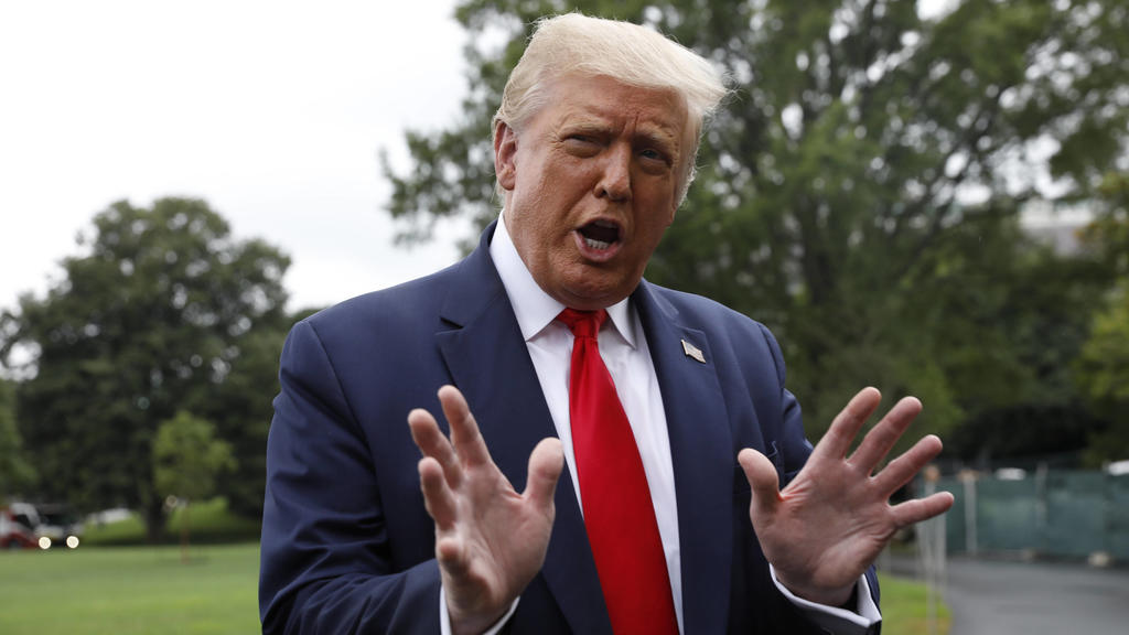 President Donald Trump stops and speaks to the press on the South Lawn of the White House in Washington, DC before departing to Florida on Friday, July 31, 2020. PUBLICATIONxINxGERxSUIxAUTxHUNxONLY WAX20200731162 YurixGripas