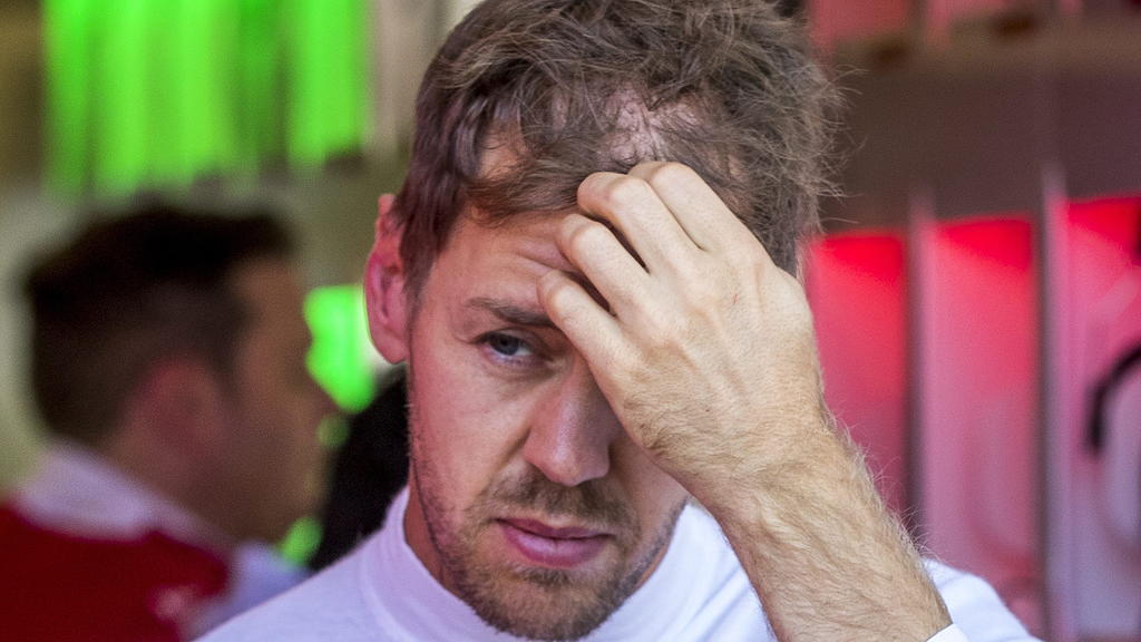 epa05596882 German Formula One driver Sebastian Vettel of Scuderia Ferrari walks after the first practice session at the Circuit of the Americas, in Austin, Texas, USA, 21 October 2016. The United States Formula One Grand Prix takes place on 23 Octob