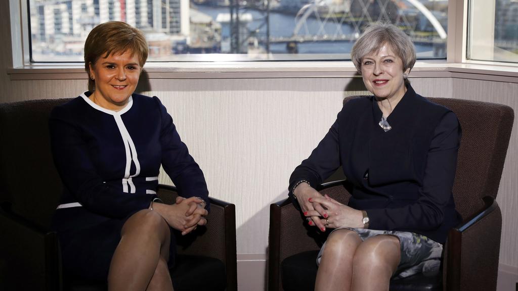 Britain's Prime Minister Theresa May and Scotland's First Minister Nicola Sturgeon meet in a hotel in Glasgow, Scotland, March 27, 2017. REUTERS/Russell Cheyne