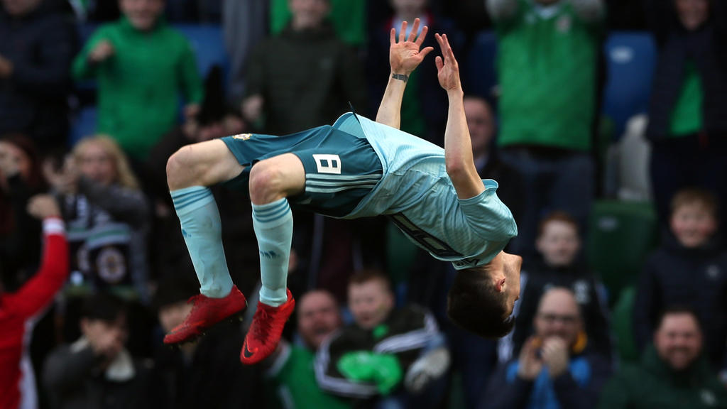24.03.2018, Nordirland, Belfast: Fußball: Freundschaftsspiel, Nordirland - Südkorea. Paul Smyth aus Nordirland jubelt nach einem Treffer. Foto: Brian Lawless/PA Wire/dpa +++ dpa-Bildfunk +++