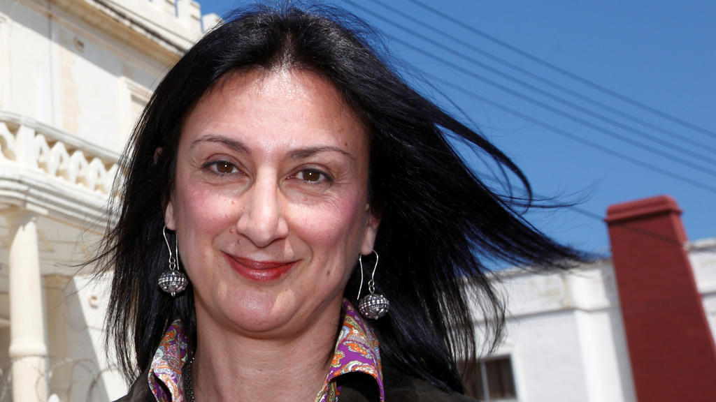Maltese investigative journalist Daphne Caruana Galizia poses outside the Libyan Embassy in Balzan, Malta April 6, 2011. Picture taken April 6, 2011. To match Special Report MALTA-DAPHNE/ REUTERS/Darrin Zammit Lupi
