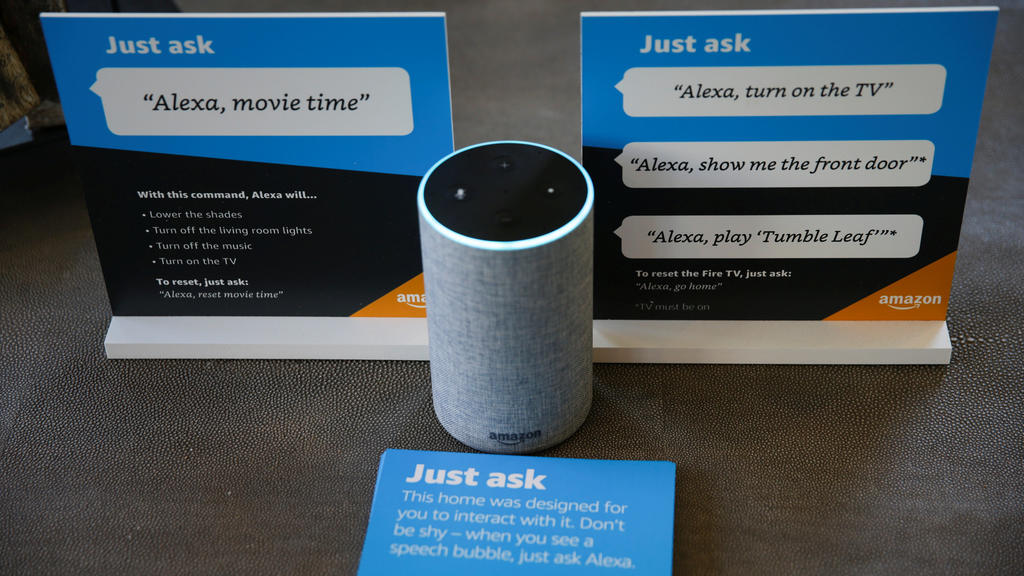 Prompts on how to use Amazon's Alexa personal assistant are seen alongside an Amazon Echo in an Amazon ‘experience center’ in Vallejo, California, U.S., May 8, 2018. Picture taken on May 8, 2018. REUTERS/Elijah Nouvelage